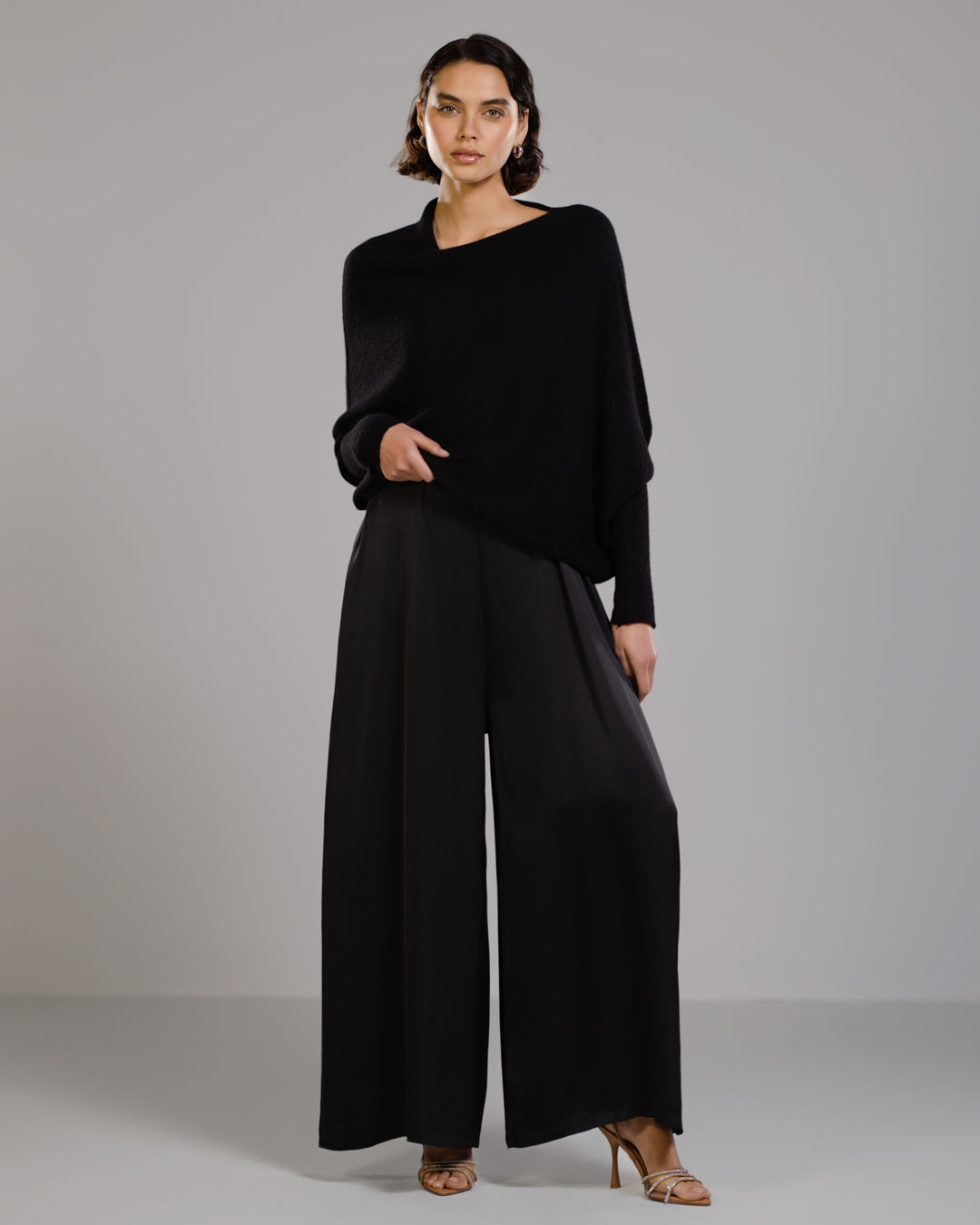 Women's Black Asymmetrical Draped Seamless Knit Top