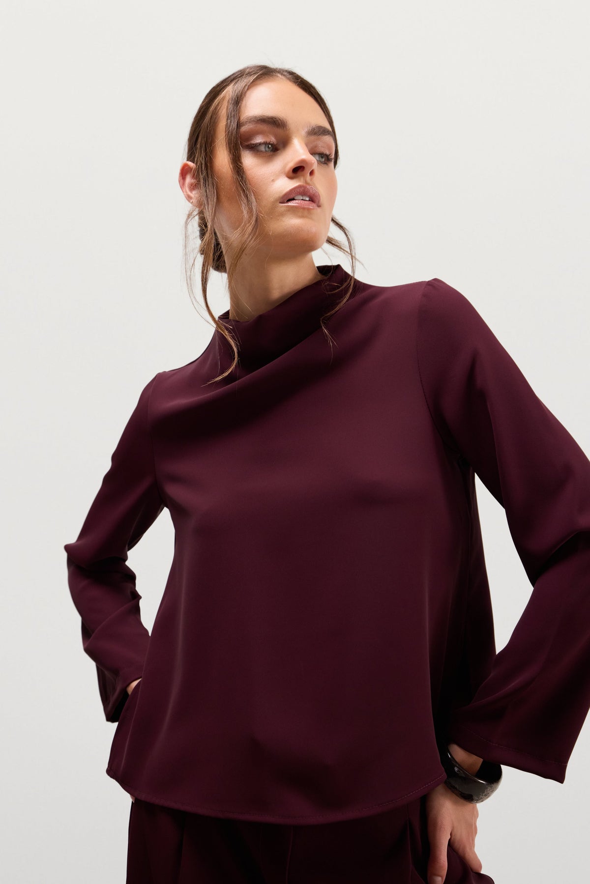 Women's Burgundy High Neck Top with Sleeveless Design