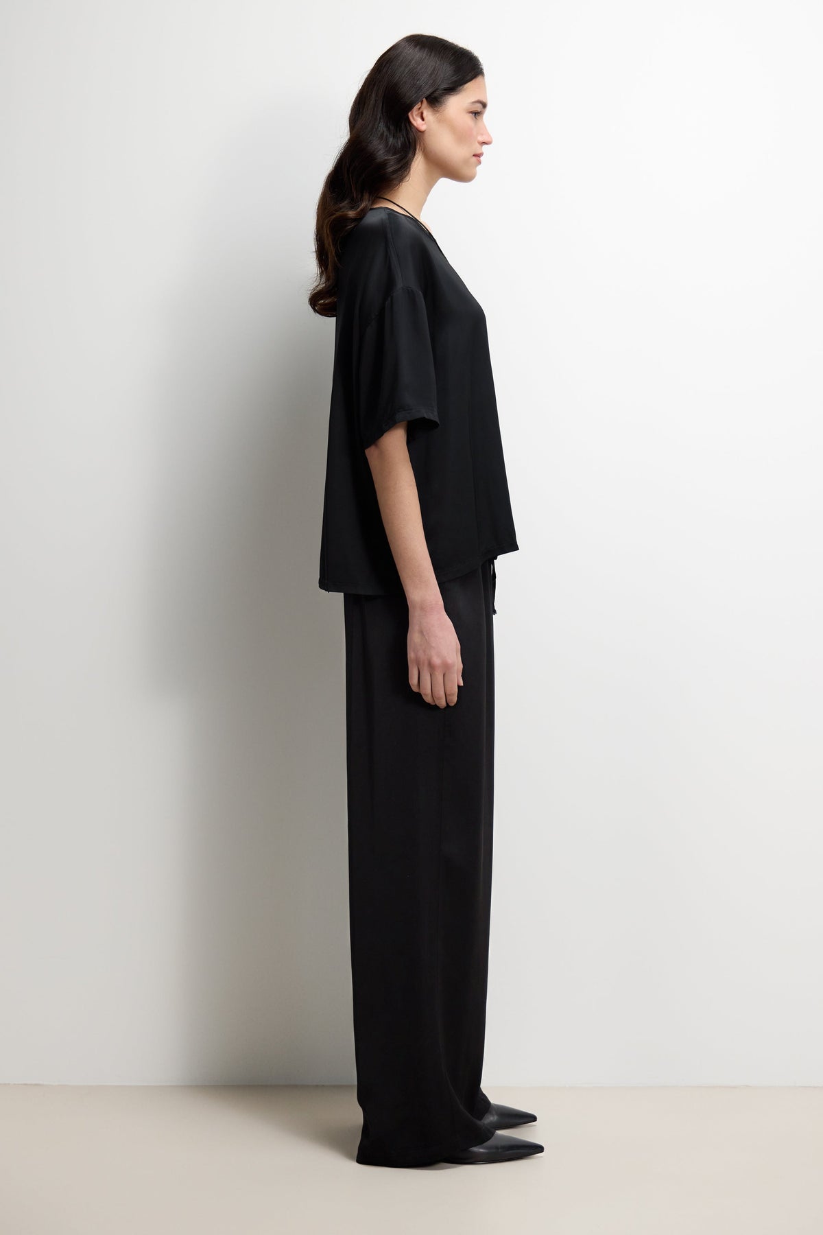 Women's Black Satin Top with Back Slit Detail and Elegant Design