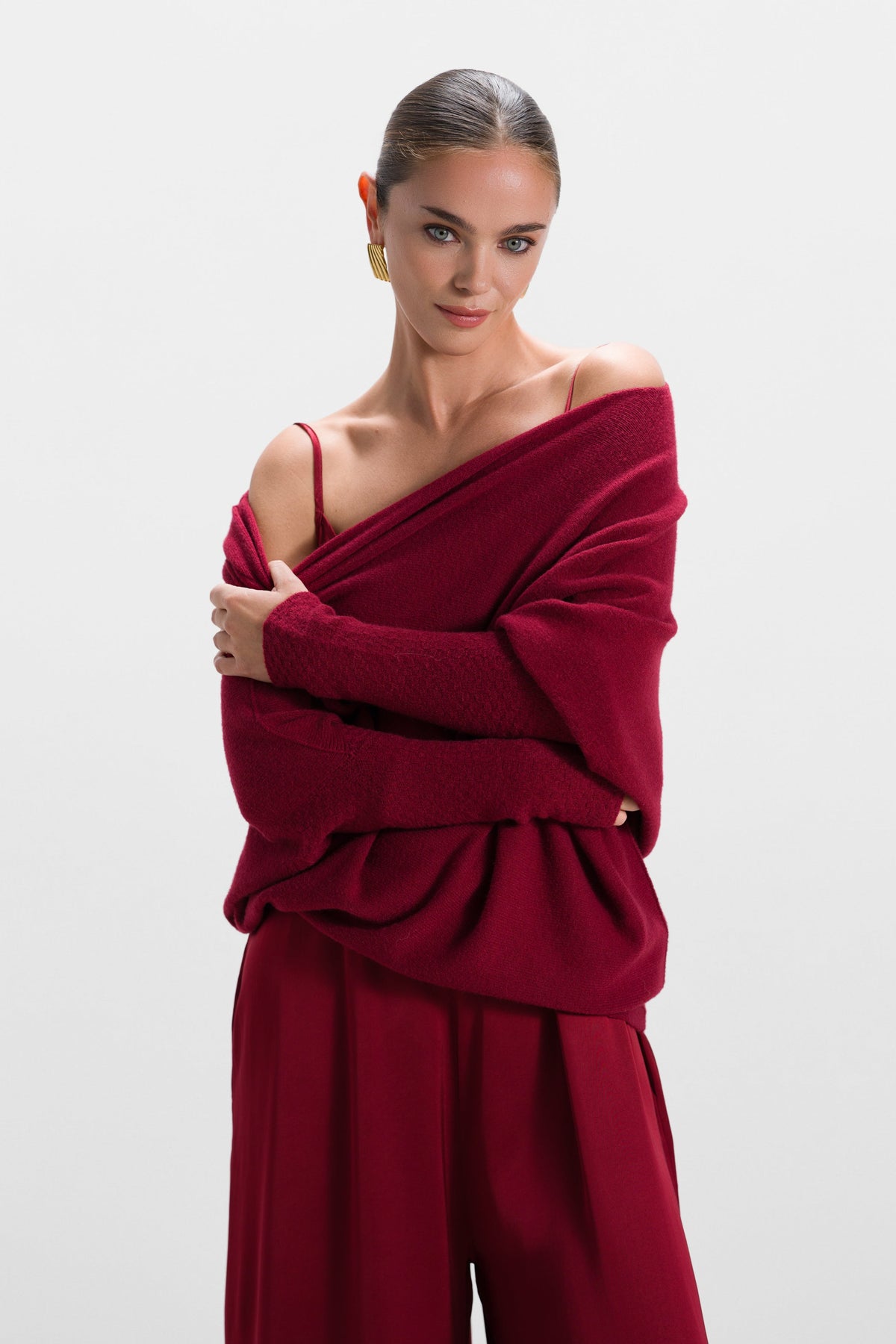 Women's Carmine Red Seamless Knit Top with Asymmetric Draped Design