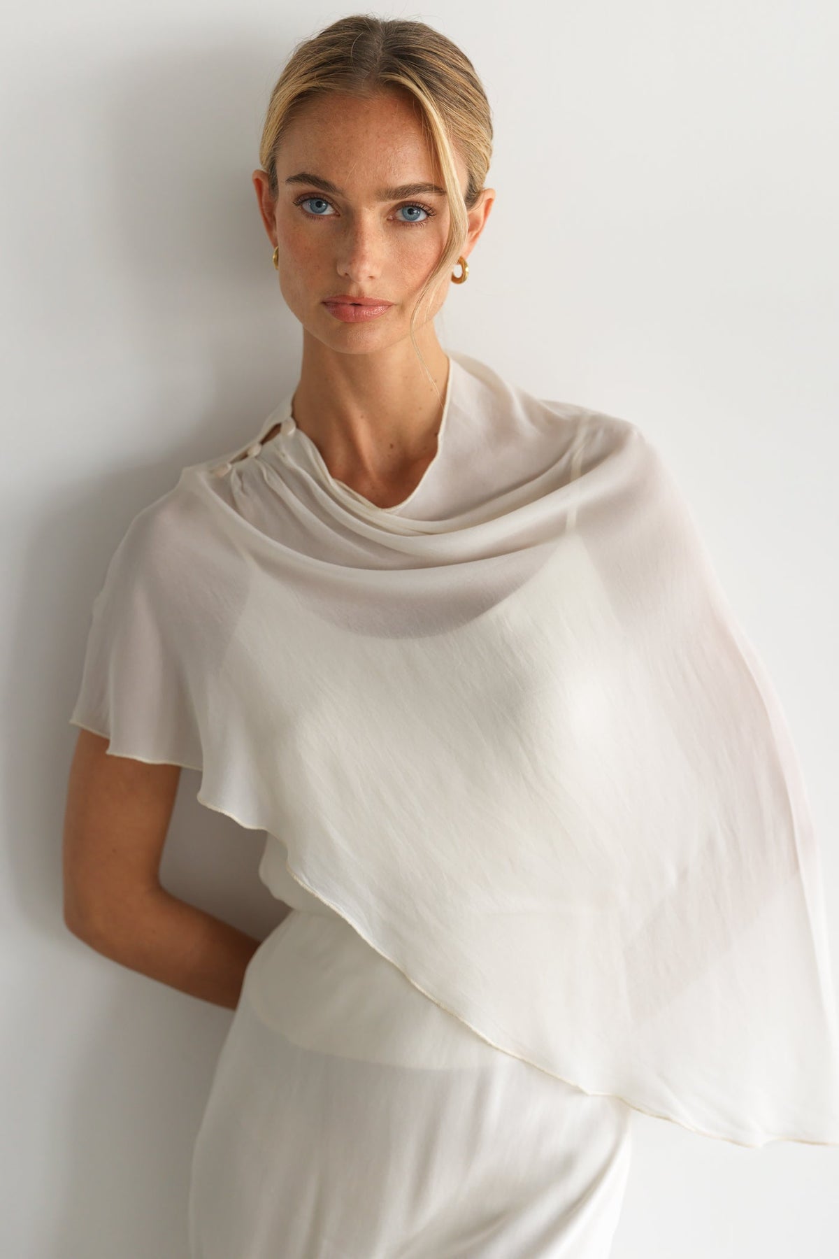 Women's Asymmetric Poncho in Ivory