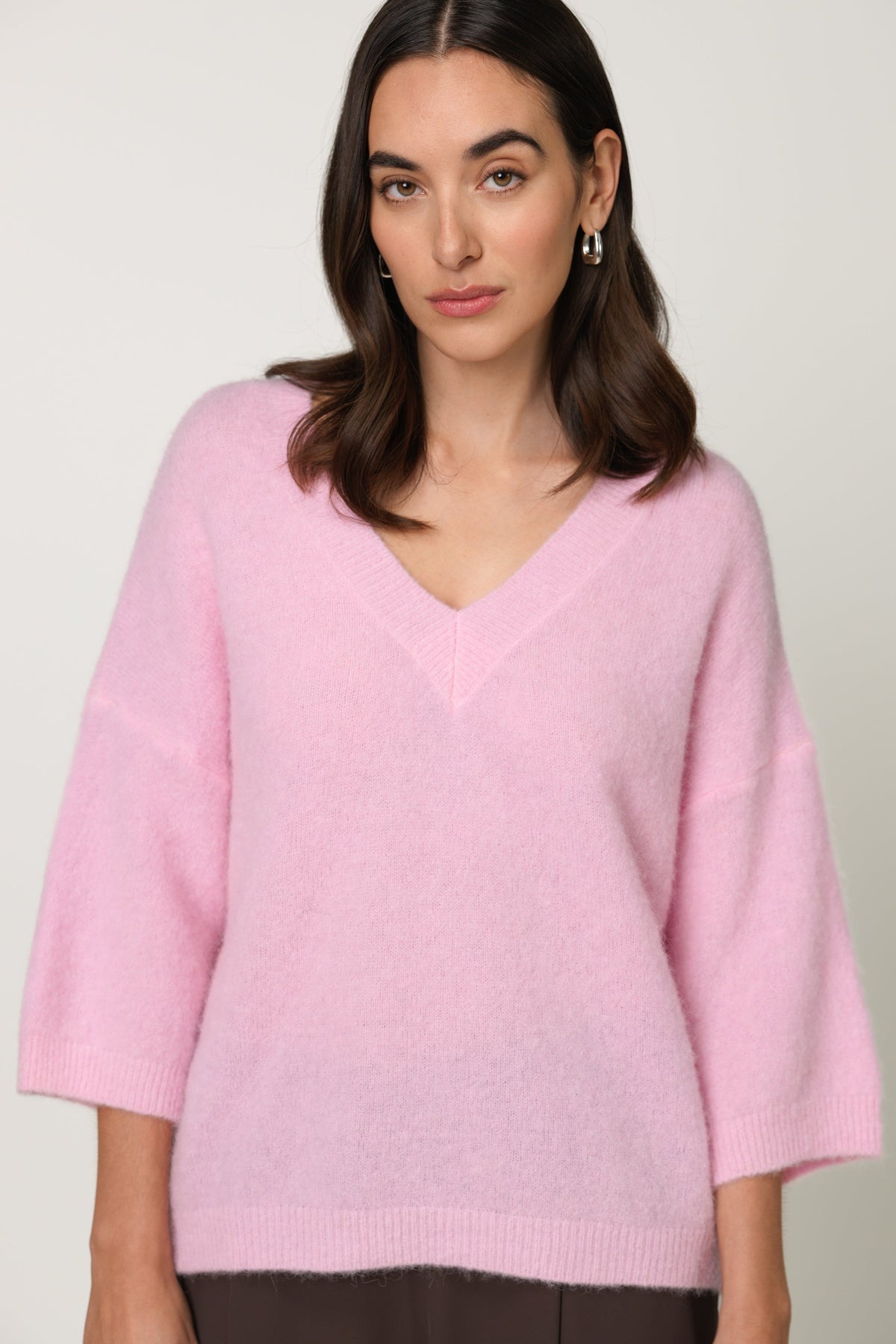 Women's Light Pink Sweater with Classic Knit Design
