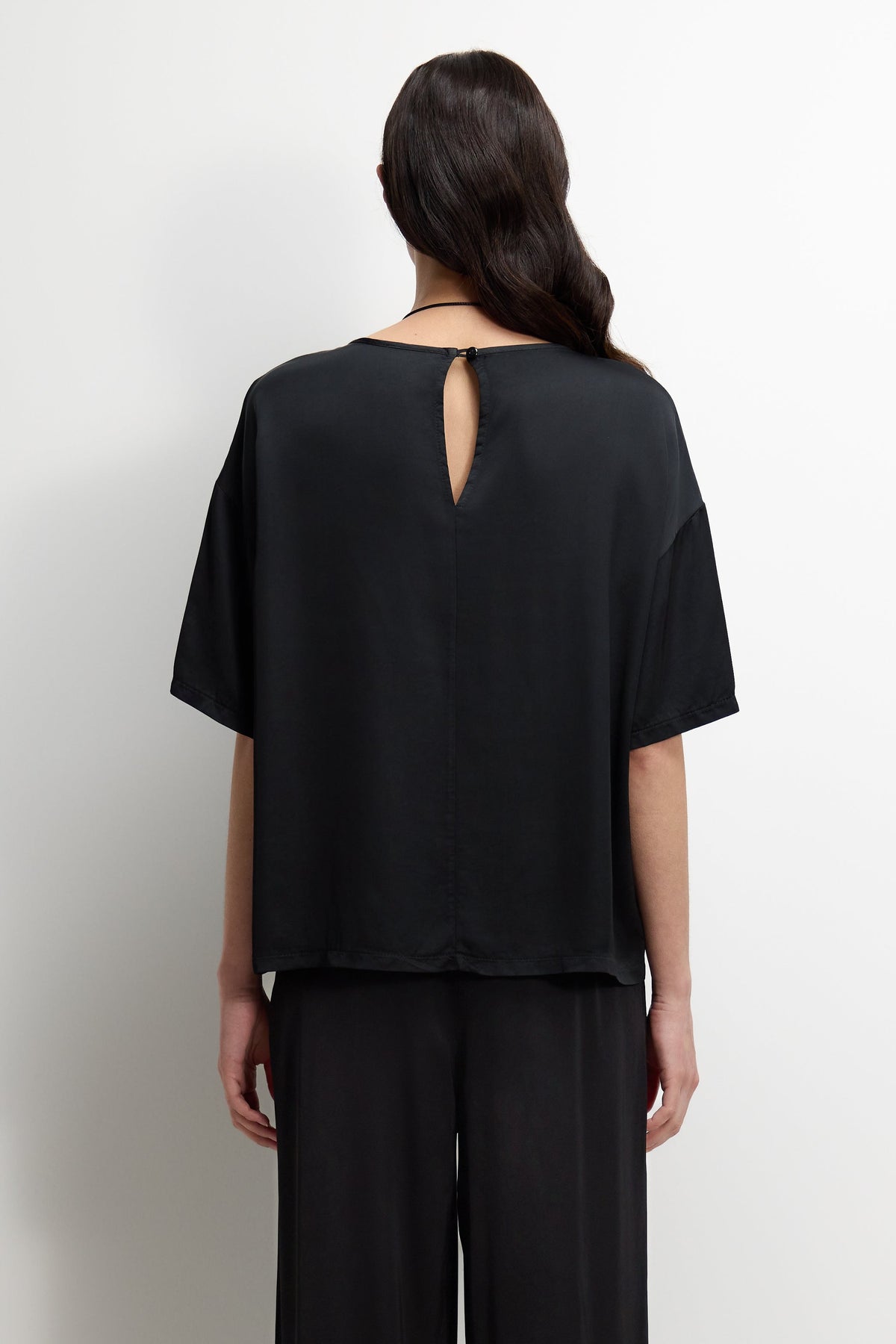 Women's Black Satin Top with Back Slit Detail and Elegant Design