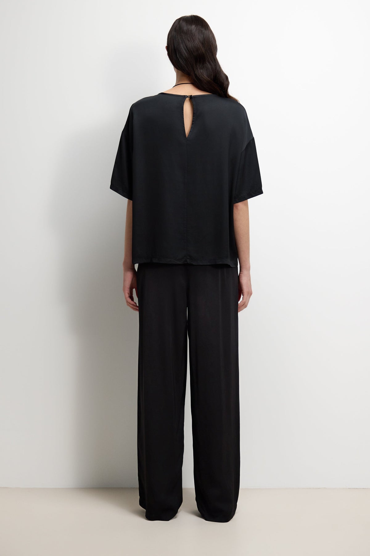 Women's Black Satin Top with Back Slit Detail and Elegant Design