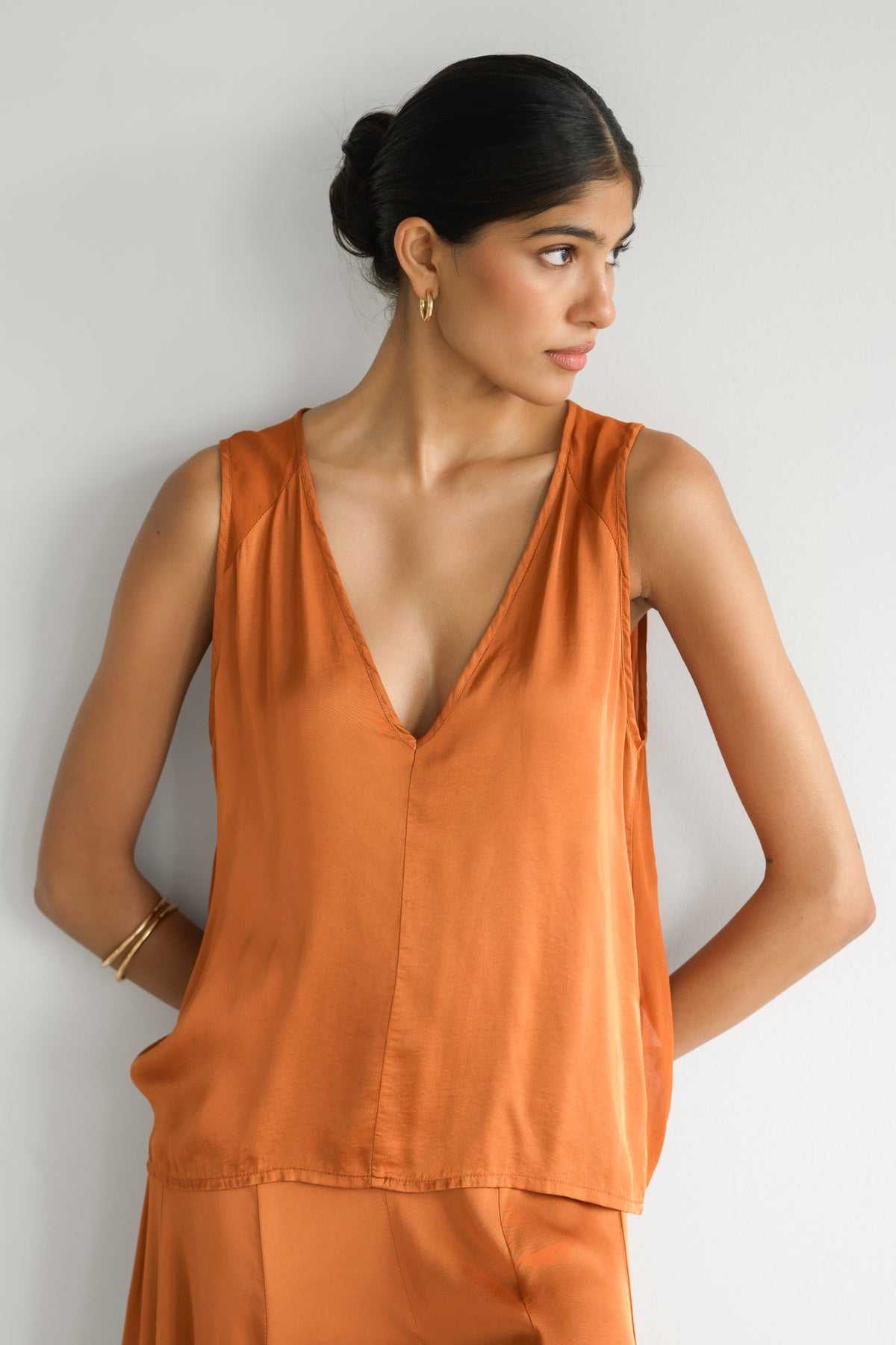 Women's V-Neck Satin Top in Sunset Orange with Sheer Back